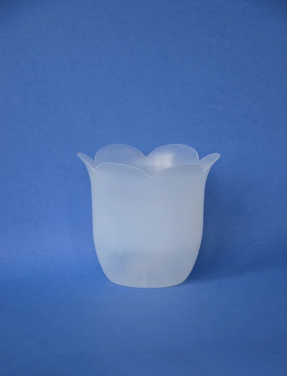 Tulip-shaped candle casing.