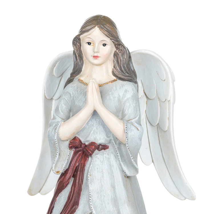 Anioł ze Świętą Rodziną Favola 25 cm - podświetlana figurka - zbliżenie twarzy i dłoni anioła