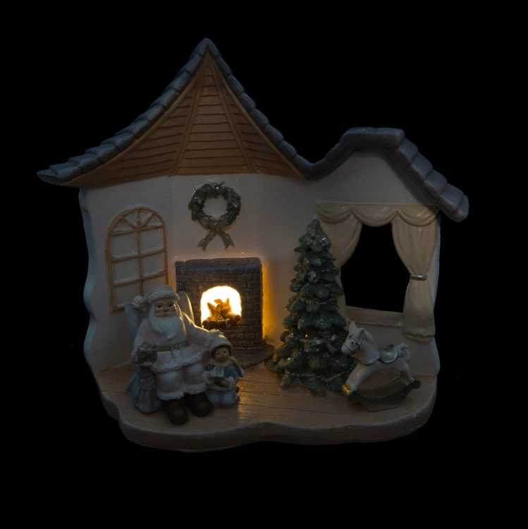 Domek świąteczny LED Favola 17 cm - figurka z bateriami - włączone podświetlenie LED